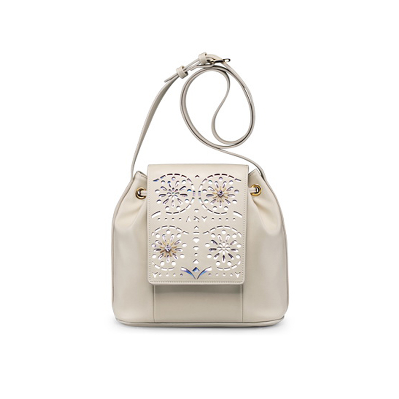 Laser cut flora pattern bucket bag